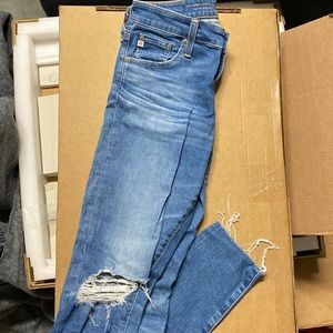 AG skinny jeans size 27R - small tear (in photo) on left knee